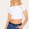 https://cdn-img.prettylittlething.com/8/b/6/5/8b65c8fc04a17bc77796c758a3ae399948539fbf_CNF0736_1_white_basic_slinky_short_sleeve_crop_top.jpg